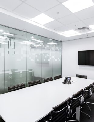 meeting room with table and screen
