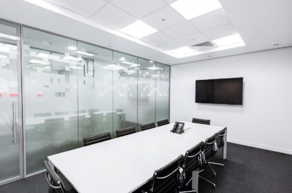 meeting room with table and screen