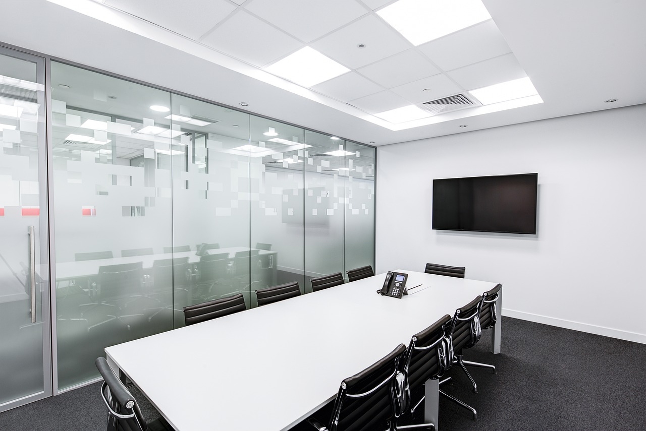 meeting room with table and screen